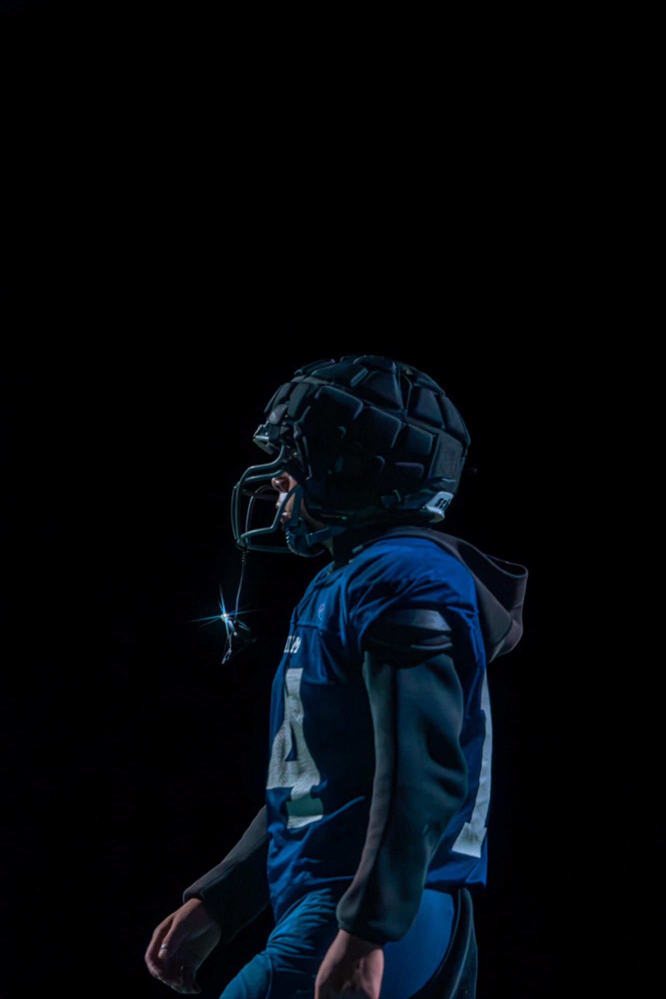 Football player dark helmet